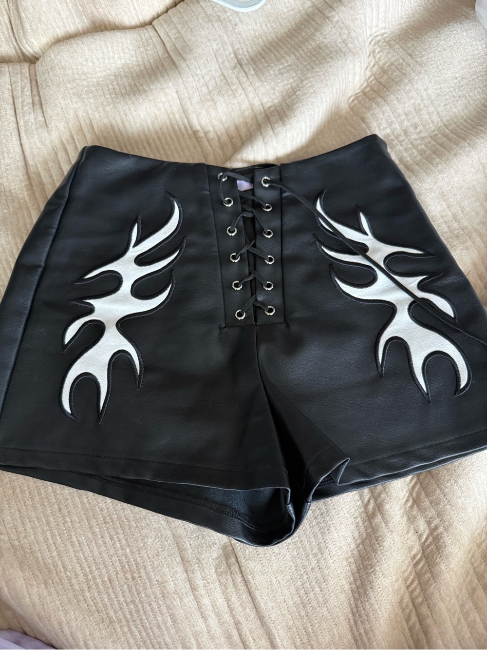 Black Faux Leather Lace-Up Shorts with White Flame Appliqué